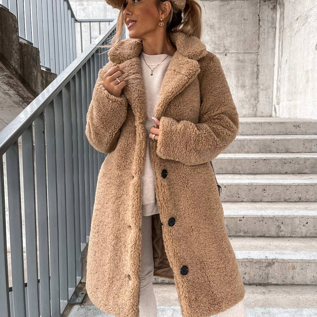 Chic women's plush oversized long coat, perfect warm winter outerwear with button front for elegant cold weather fashion.