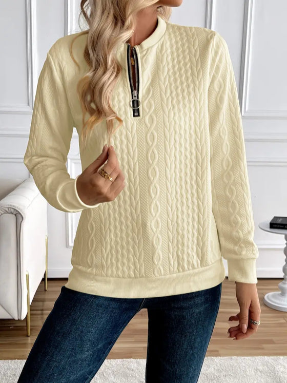 Stylish women's zip-up sweater with a chic quilted design for everyday comfort.