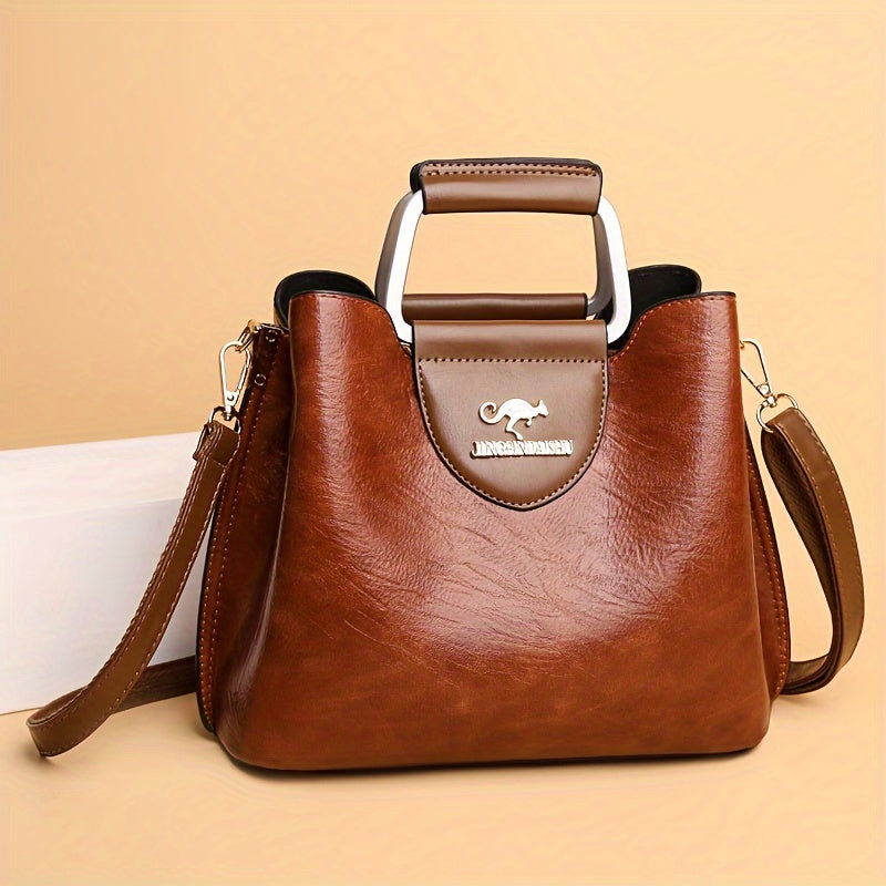 Elegant black leather handbag for women, versatile for any occasion.