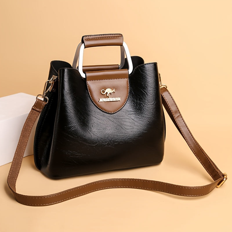 Stylish brown crossbody bag, a must-have designer accessory for women.
