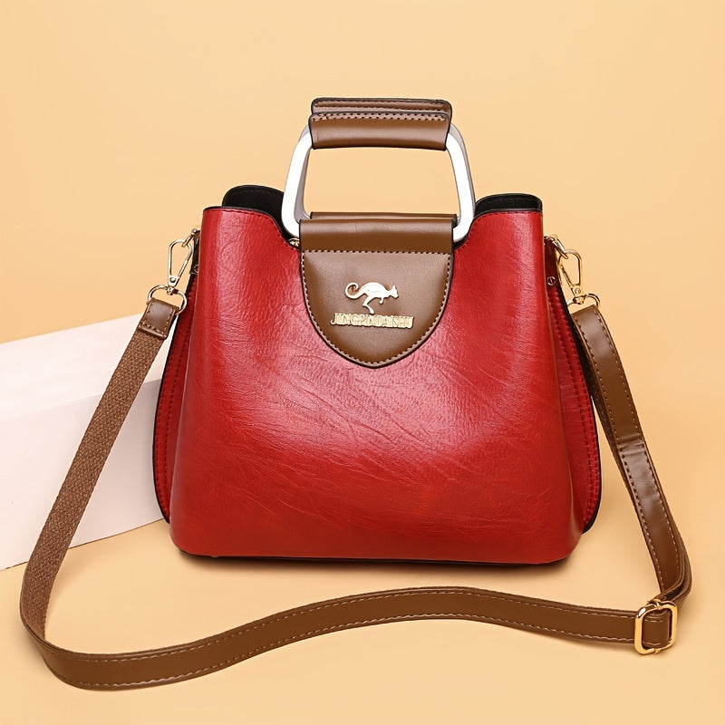 Fashionable women's leather shoulder bag, available in red, black, and brown.
