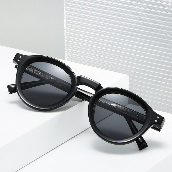 Retro round frame women's sunglasses offering UV400 protection, a classic and comfortable fit accessory.