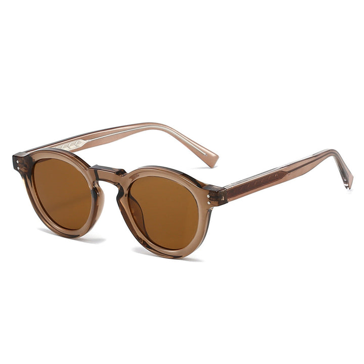 Elegant women's round sunglasses for summer, providing UV400 protection in a chic, timeless design.