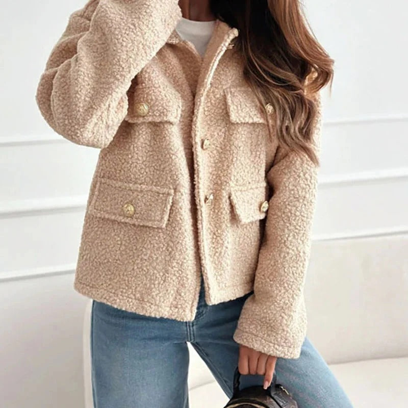 Chic women's short coat for versatile cool weather. Elegant outerwear, ideal for autumn & winter fashion.