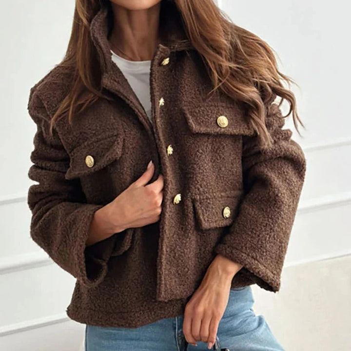 Elegant women's short coat, a chic jacket for versatile winter fashion. Stylish outerwear for ladies.