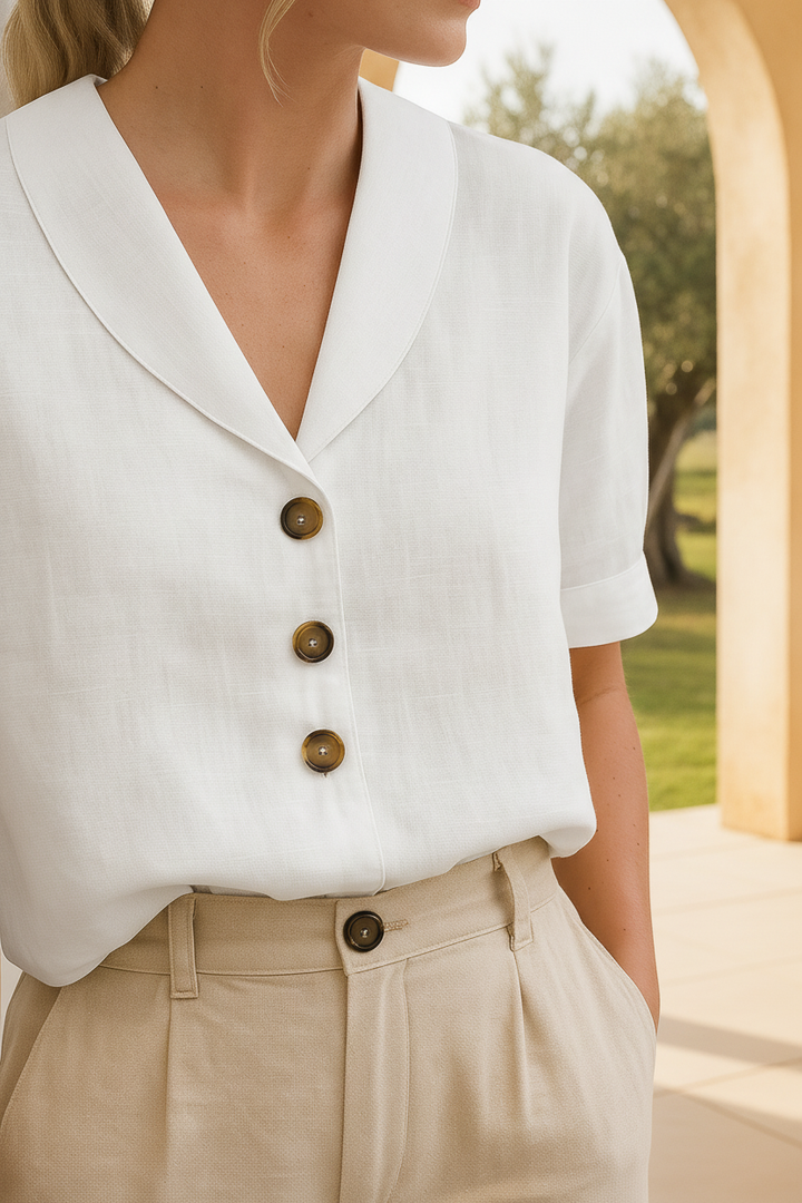 Chic women's short sleeve blouse with elegant shawl collar and button front, perfect for smart casual wear.