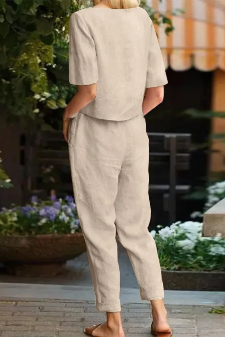 Full view of women's comfortable crop top & tapered trousers set, showcasing soft fabric and casual summer style.
