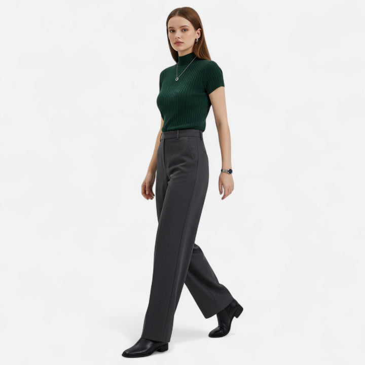 Elegant short-sleeve turtleneck blouse for women, ideal for smart casual and office wear.