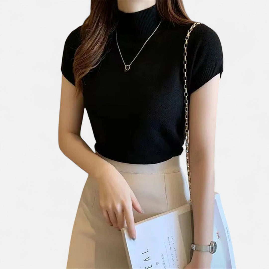 Versatile women's short-sleeve turtleneck blouse, offering an elegant solution for daily wear.