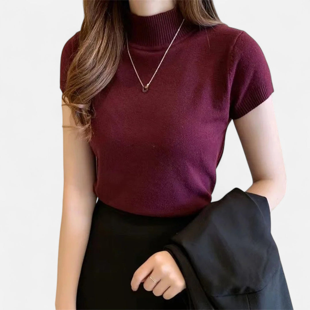 High-quality women's short-sleeve turtleneck blouse, suitable for both professional and casual occasions.