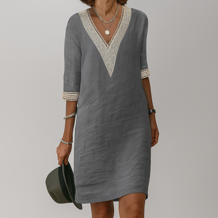 Comfortable women's sleeveless summer dress offering effortless chic style for beach days or vacation wear.