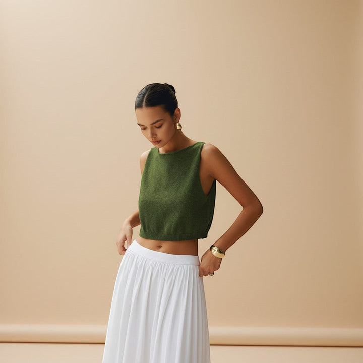 Trendy women's sleeveless textured crop top. Clean neckline, perfect for casual or vacation outfits.