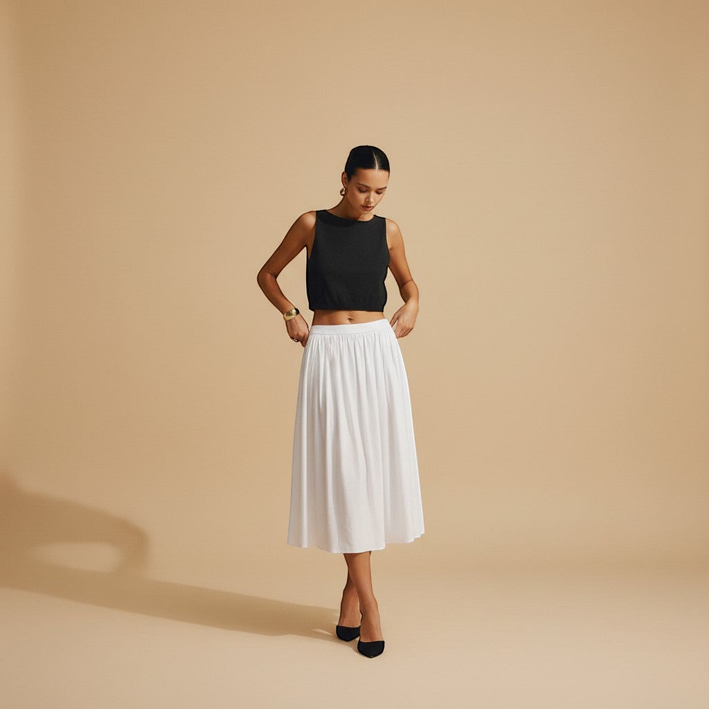 Women's chic sleeveless tank top with clean neckline. Textured crop style for versatile summer wear.