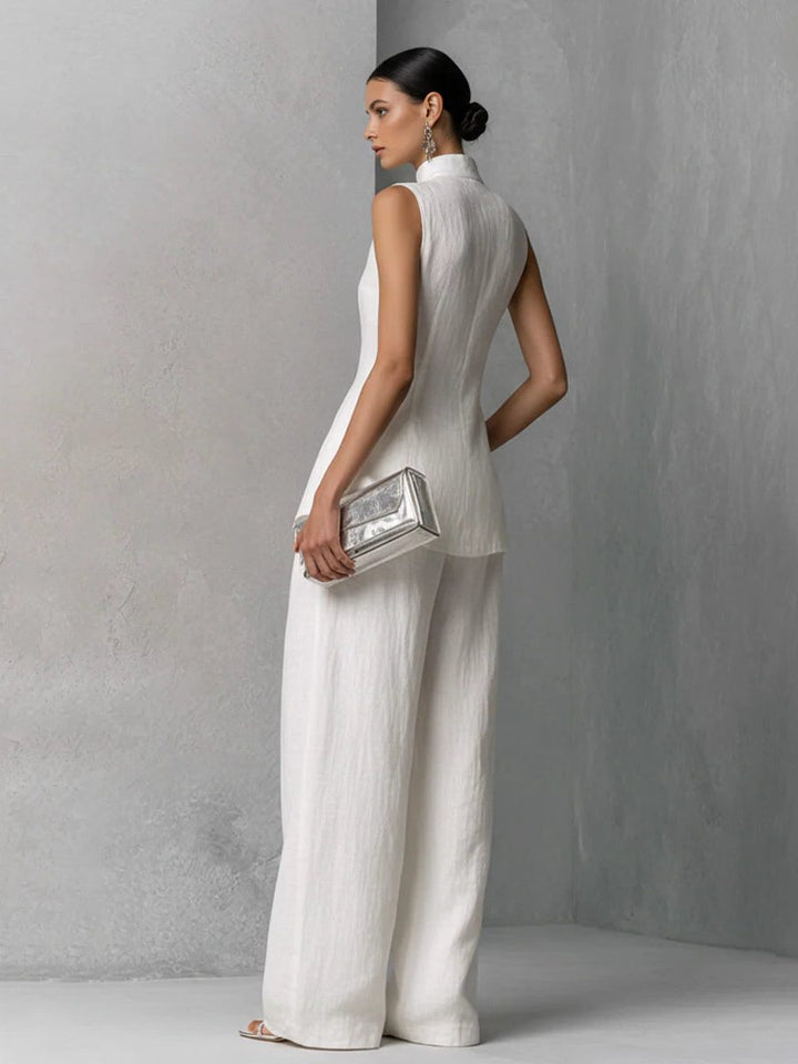 Elegant white women's sleeveless wide-leg pant set, perfect for stylish summer casual wear and events.
