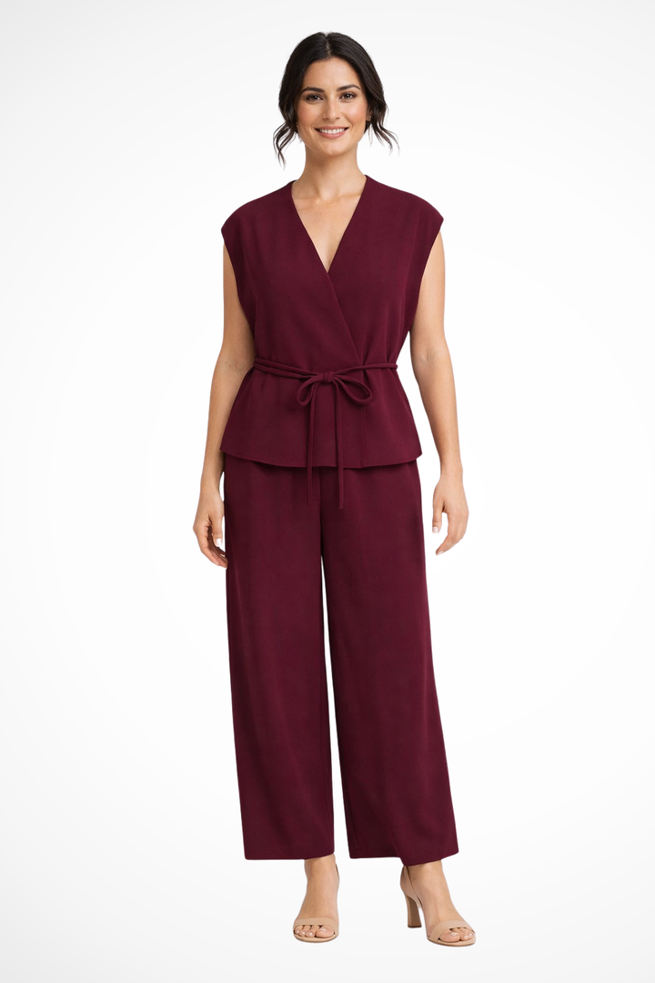 Chic women's sleeveless wrap top and high-waist wide leg trousers, a stylish two-piece set.