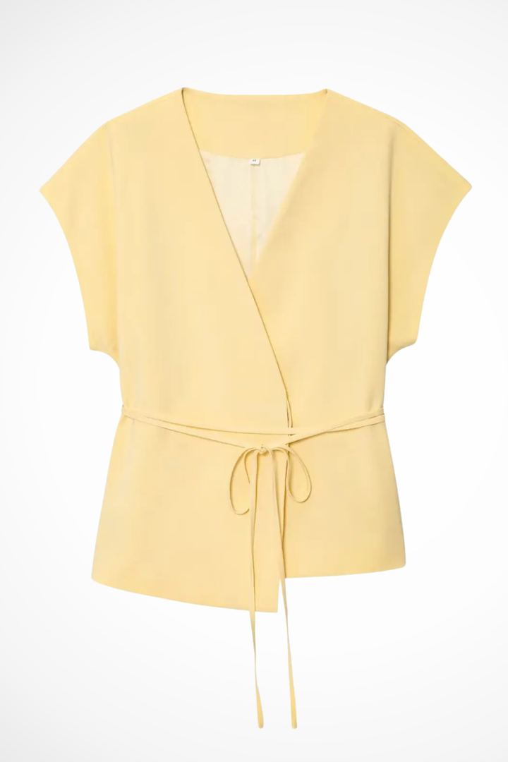 Women's high-waisted wide leg trousers with a matching sleeveless wrap top for a chic coordinated set.
