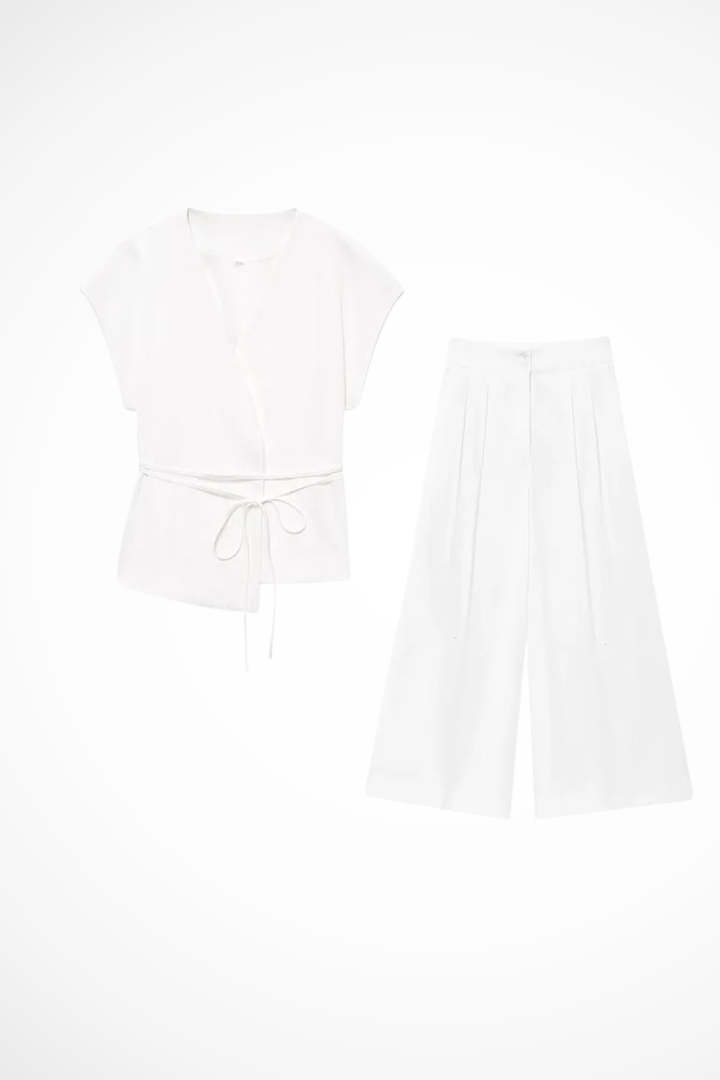 Versatile women's fashion: a sleeveless wrap top & wide leg trousers, suitable for casual or business.