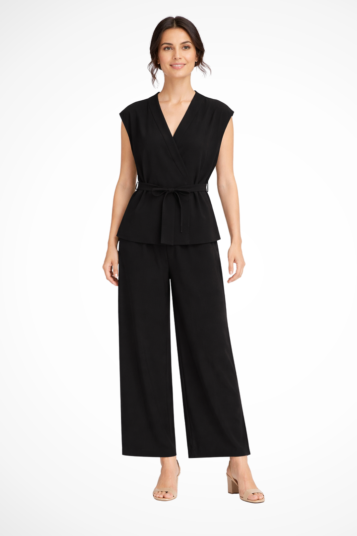 Women's summer fashion: a sleeveless wrap top paired with high-waisted wide leg trousers outfit.