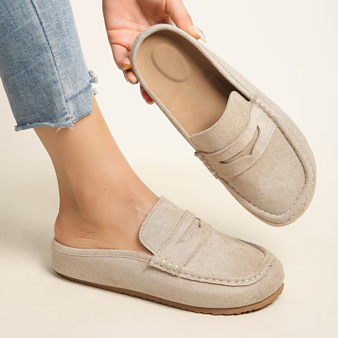 Chic women's slip-on loafers. Stylish and comfortable flat shoes for everyday elegance. Perfect casual footwear.