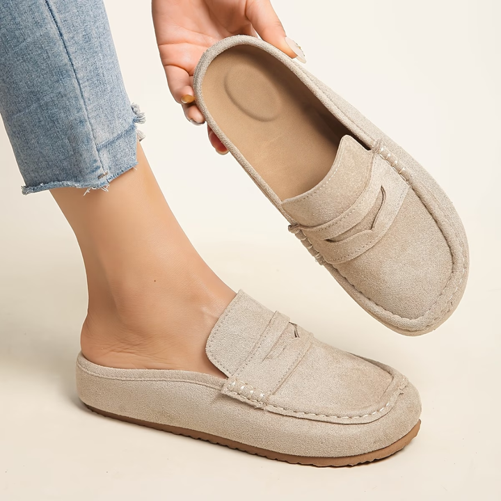 Chic women's slip-on loafers. Stylish and comfortable flat shoes for everyday elegance. Perfect casual footwear.
