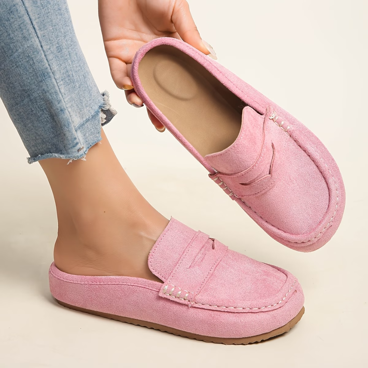 Women's comfort slip-on loafers. Elegant and practical flat shoes for casual and everyday wear. Stylish footwear.
