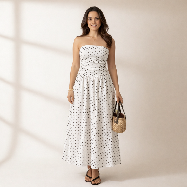 Chic women's strapless polka dot maxi dress, perfect for elegant summer parties or casual wear.