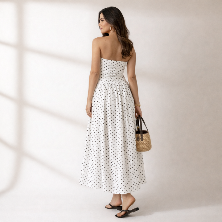 Elegant women's polka dot strapless maxi dress, ideal for summer fashion, parties, or stylish casual outfits.