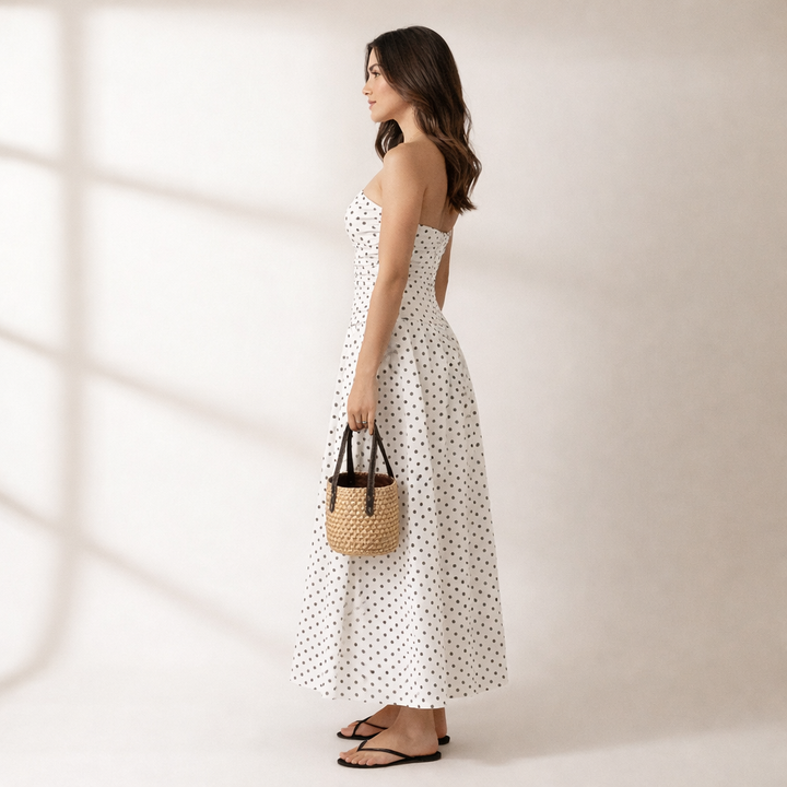 Beautiful women's strapless maxi dress in a classic polka dot print, a versatile and chic summer party dress.
