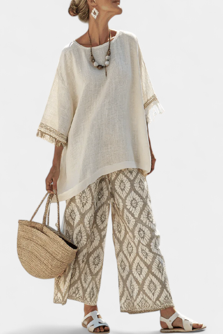 Chic women's striped blouse & wide-leg pants set. Perfect casual summer fashion or vacation wear.