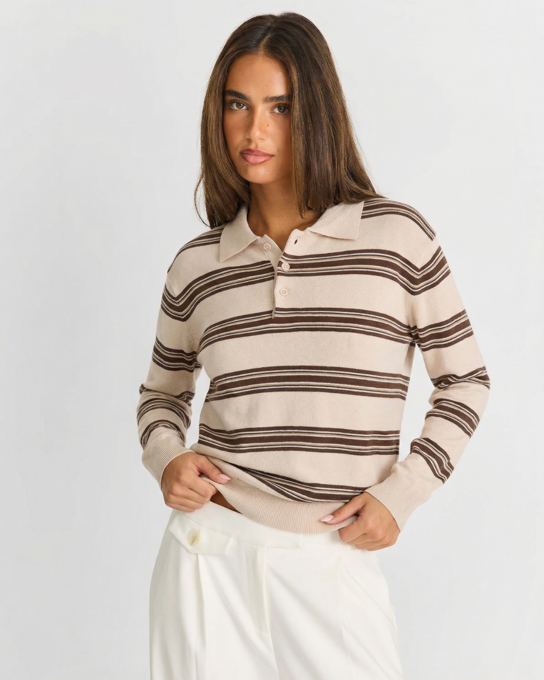 Chic women's striped polo knit sweater. Relaxed fit pullover, perfect for casual or everyday autumn fashion.