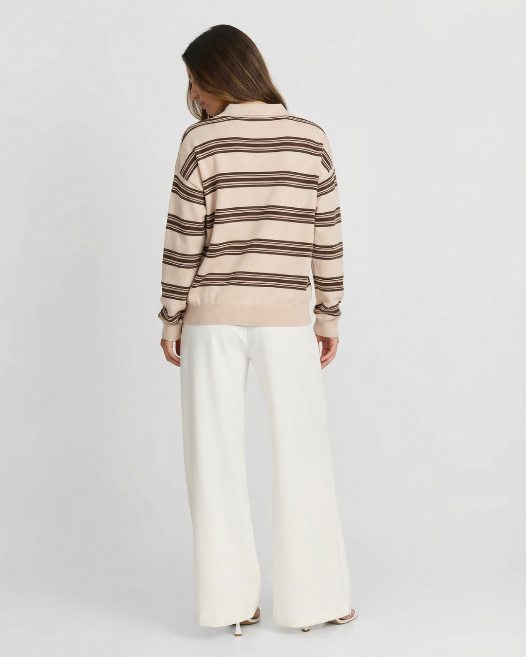 Fashion knitwear: women's striped polo sweater. Soft, relaxed fit pullover top for comfortable everyday style.