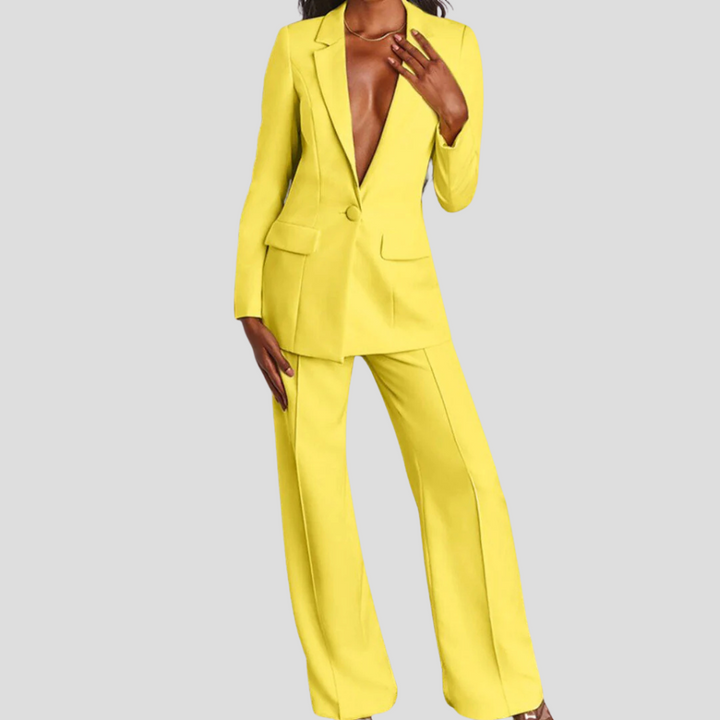 Chic women's tailored blazer and trouser set in black, professional office wear.