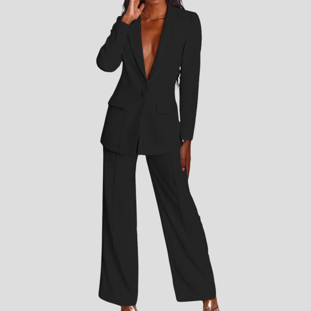 A flat lay of a women's blazer and trouser set, displaying the complete co-ord.