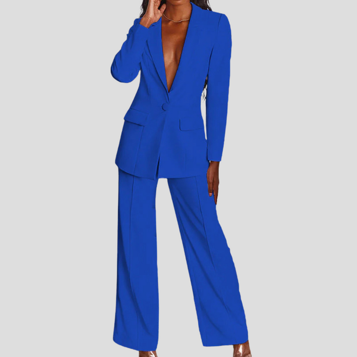 High-quality stitching detail on a women's tailored blazer and trouser set.