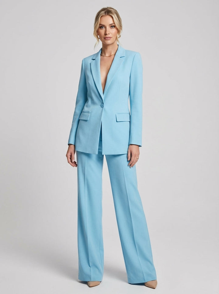 Full outfit shot of a women's chic fashion suit, blazer and trousers included.