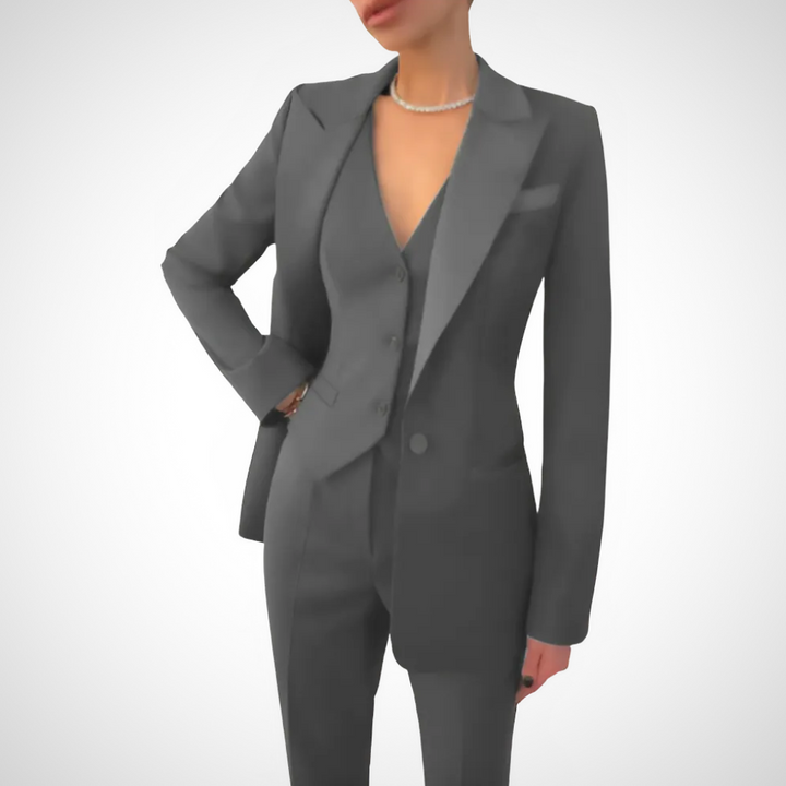 Stylish women's three-piece suit, tailored for a chic, professional look. Versatile for business, office & formal fashion.