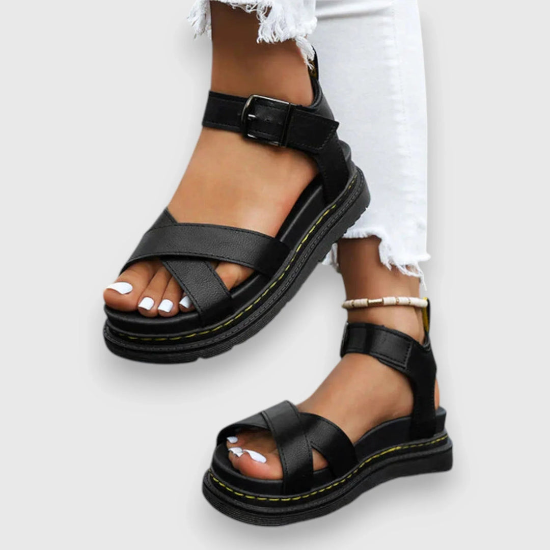 Chic women's teal platform sandals with criss-cross adjustable straps, perfect for summer comfort & everyday wear.