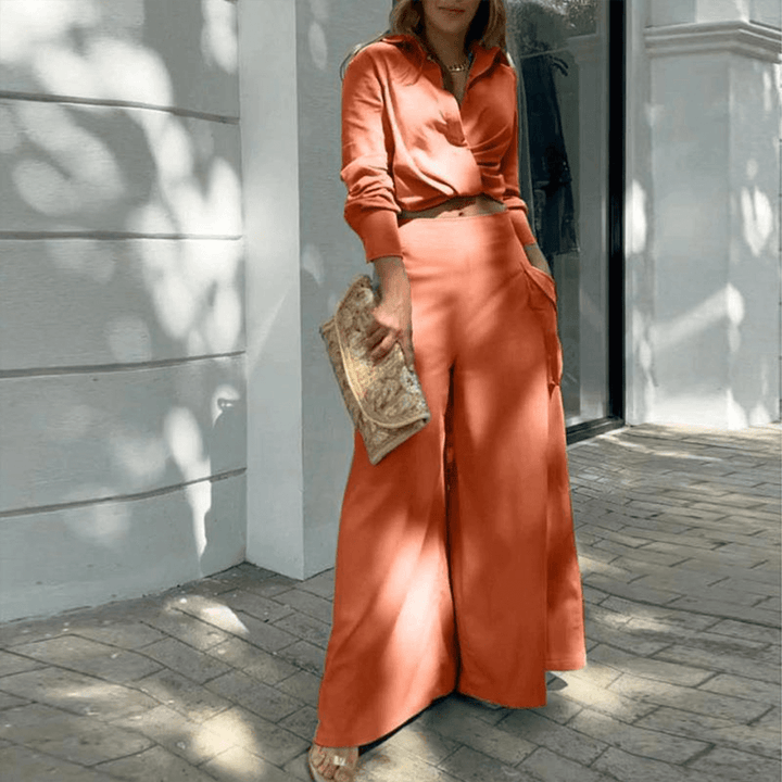 Stylish women's summer set: crop top & wide-leg cargo pants. Chic and breathable for warm weather.