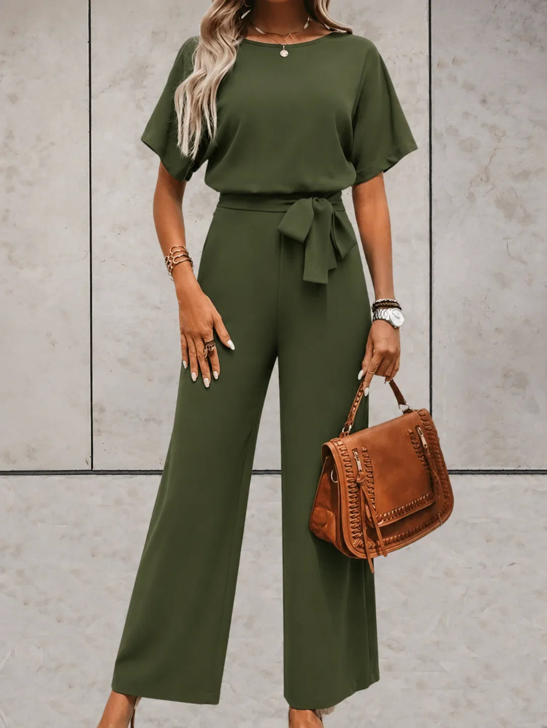 Fashionable women's spring/summer set: a short sleeve top paired with stylish wide leg pants.