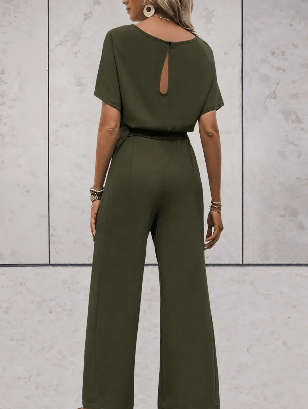 Versatile women's two-piece, combining a short sleeve top with relaxed wide leg pants for effortless style.