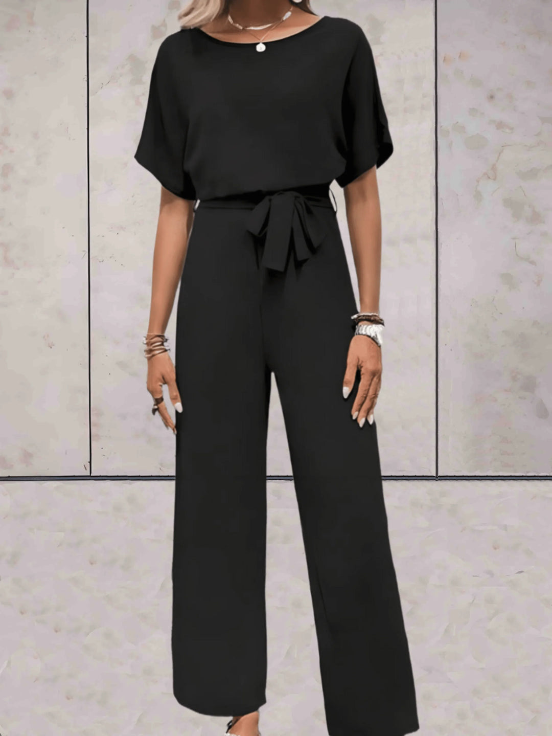 Spring/summer women's fashion: a versatile two-piece set with a comfy short sleeve top and wide leg pants.