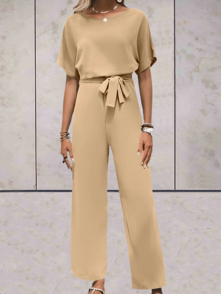 Casual yet elegant women's set featuring a short sleeve top and flattering wide leg pants for comfort.