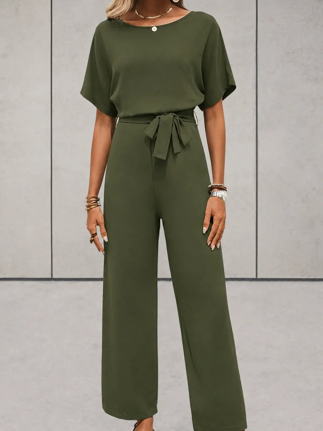 Women's coordinated two-piece outfit with a trendy short sleeve top and breathable wide leg pants.