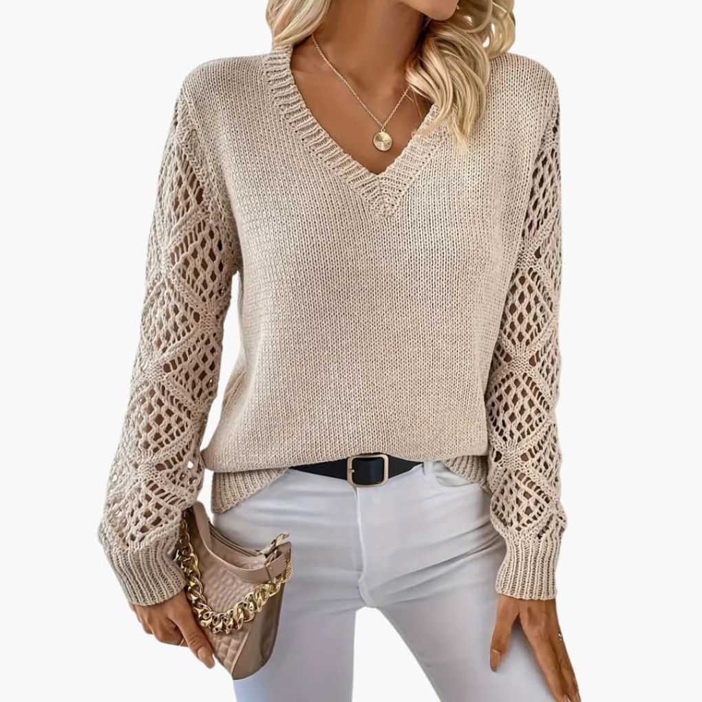 Elegant women's V-neck pullover jumper, featuring unique open sleeve details. Comfortable long sleeve for chic casual wear.