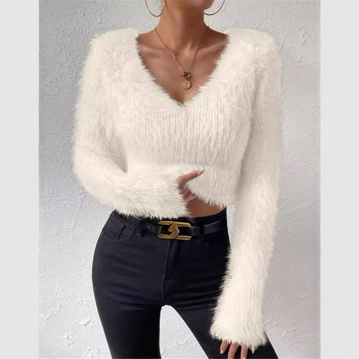Chic women's V-neck long sleeve sweater in a soft knit, perfect for elegant casual wear.