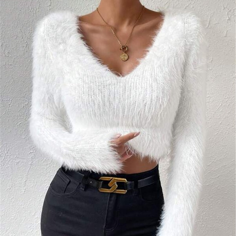 Soft long sleeve V-neck sweater for women, a stylish and comfortable essential for any wardrobe.