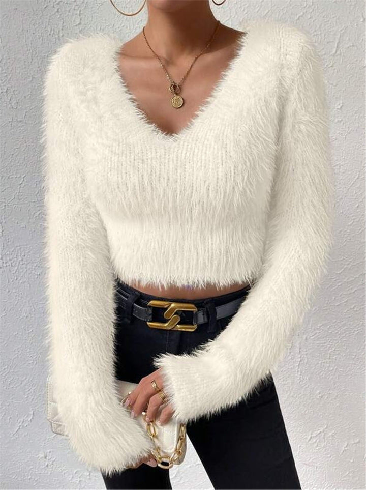 Women's cozy V-neck sweater with long sleeves, perfect for chic casual outfits and autumn style.