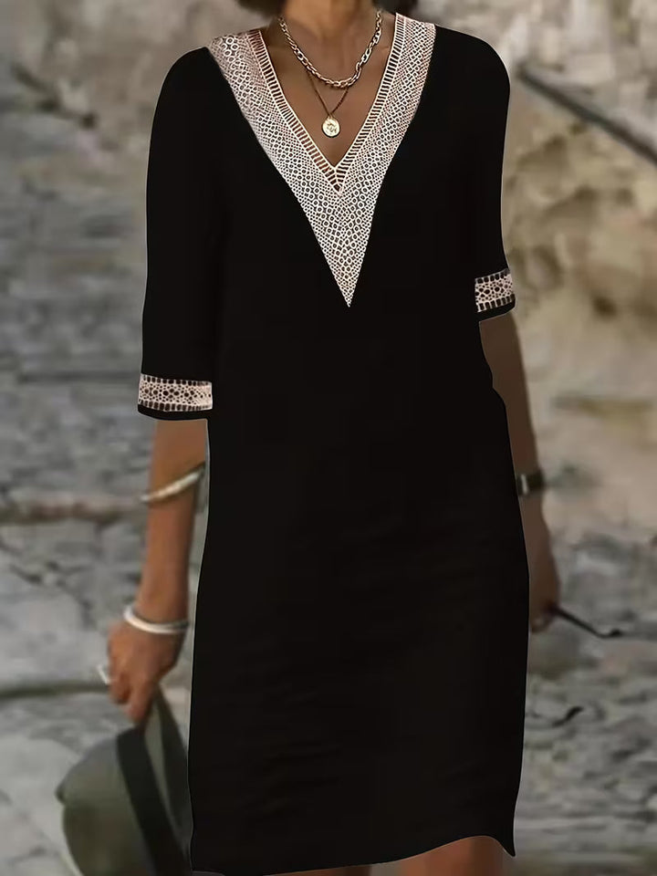 Chic women's V-neck mid-sleeve dress, perfect for versatile fashion and elegant everyday wear.