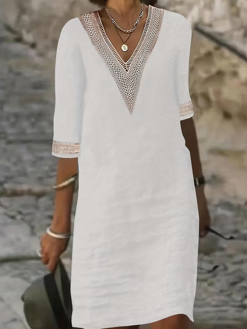 Elegant V-neck mid-sleeve women's dress, comfortable for casual and all occasions. Versatile style.
