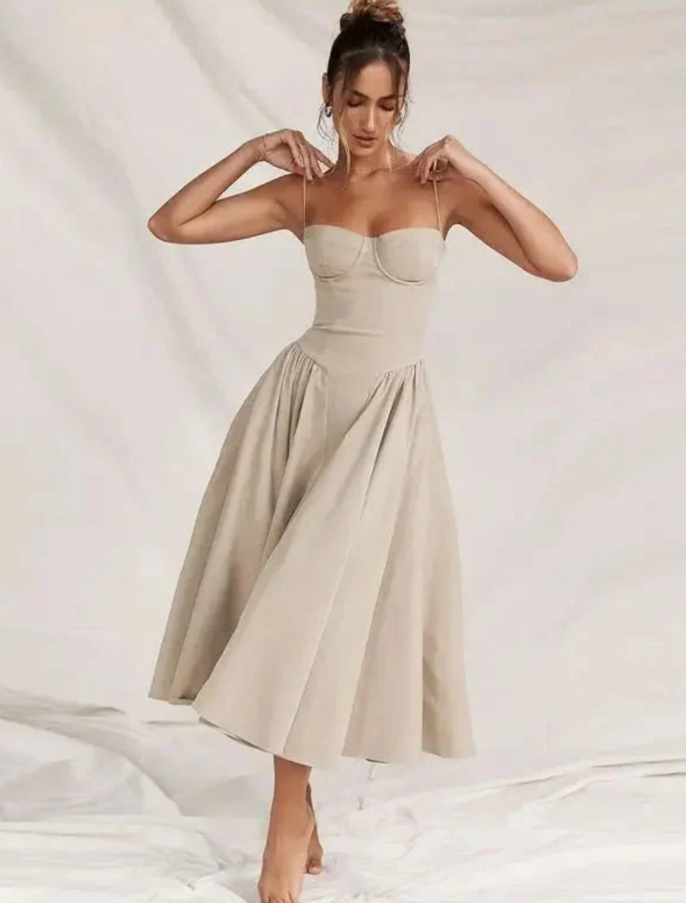 Chic women's V-neck midi dress for summer. Casual, flowy, and perfect for vacation or everyday wear.